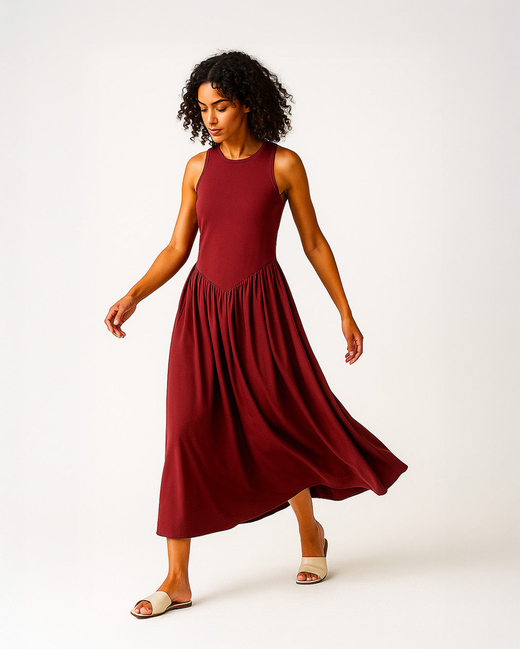 Abito lungo a giro svasato e stretto in vita