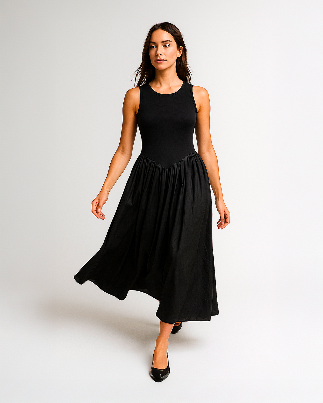 Abito lungo a giro svasato e stretto in vita