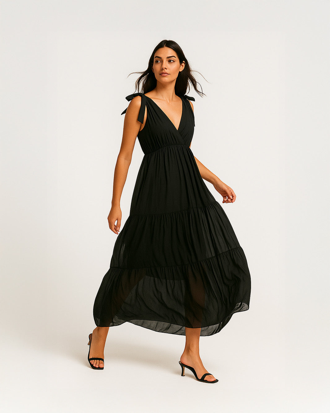 Abito lungo scollato con fiocchi sulle spalle