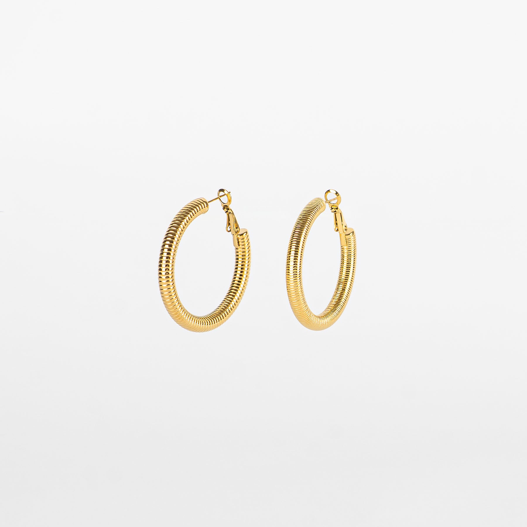 Orecchini cerchio spiral gold