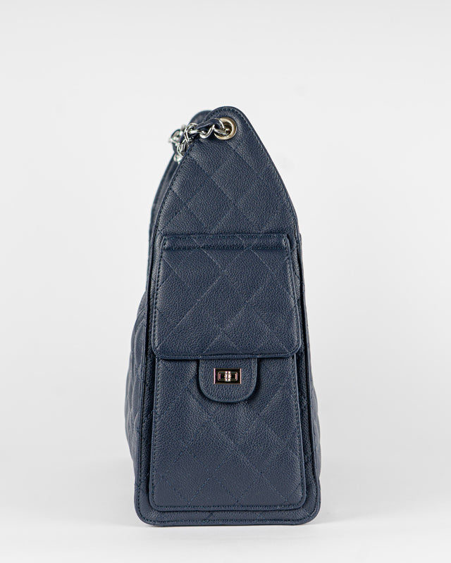 Borsa trapuntata con tasche laterali