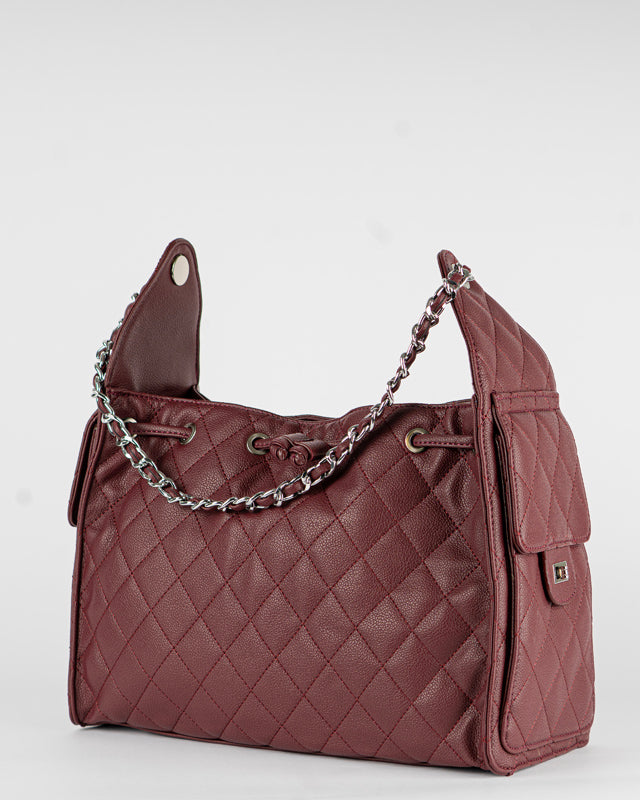 Borsa trapuntata con tasche laterali