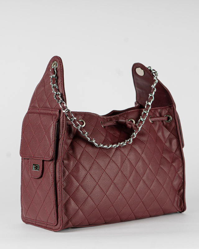 Borsa trapuntata con tasche laterali