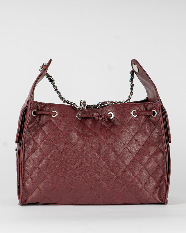 Borsa trapuntata con tasche laterali