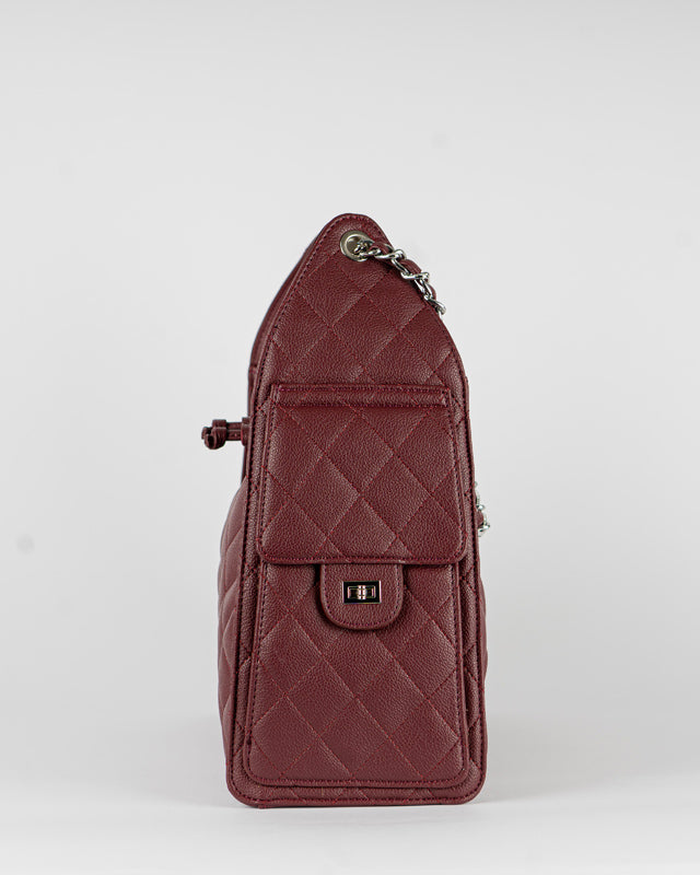 Borsa trapuntata con tasche laterali