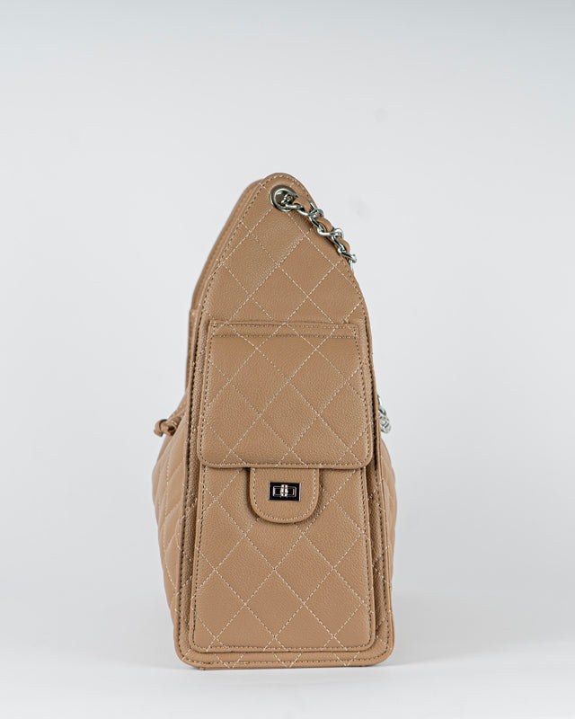 Borsa trapuntata con tasche laterali