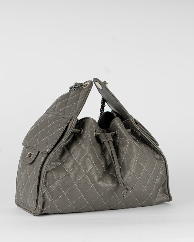 Borsa trapuntata con tasche laterali