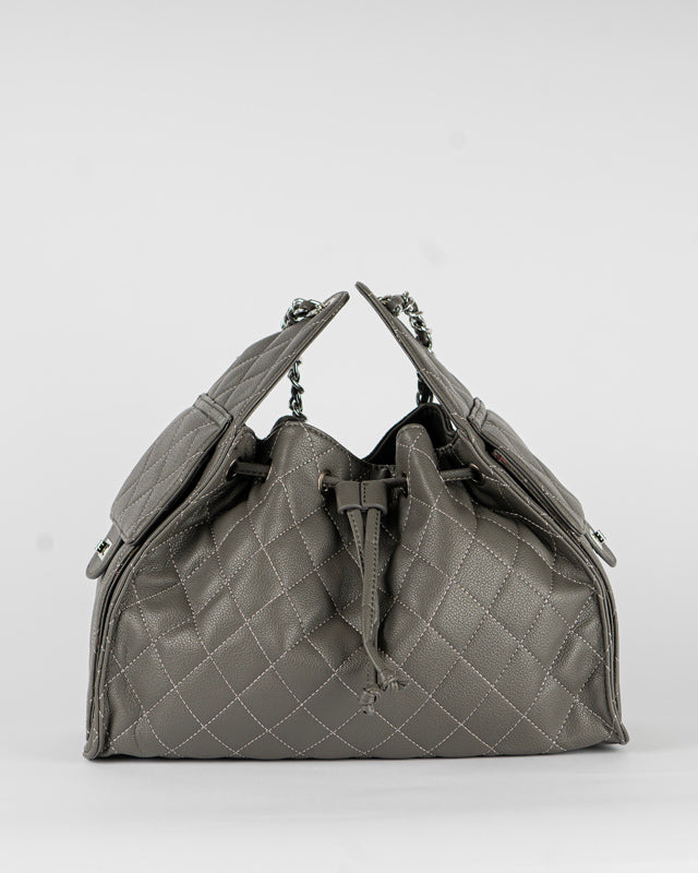 Borsa trapuntata con tasche laterali