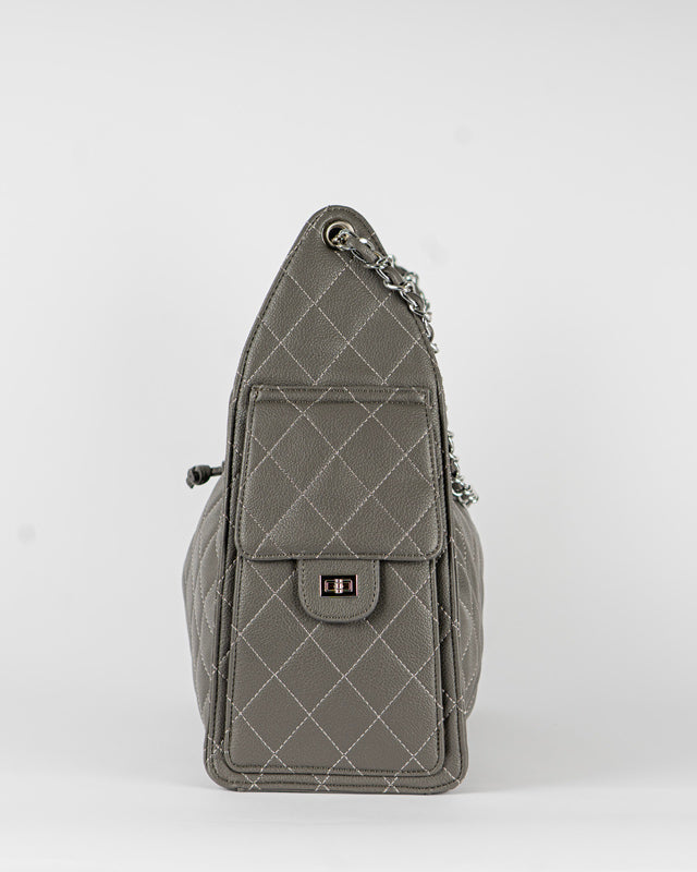 Borsa trapuntata con tasche laterali