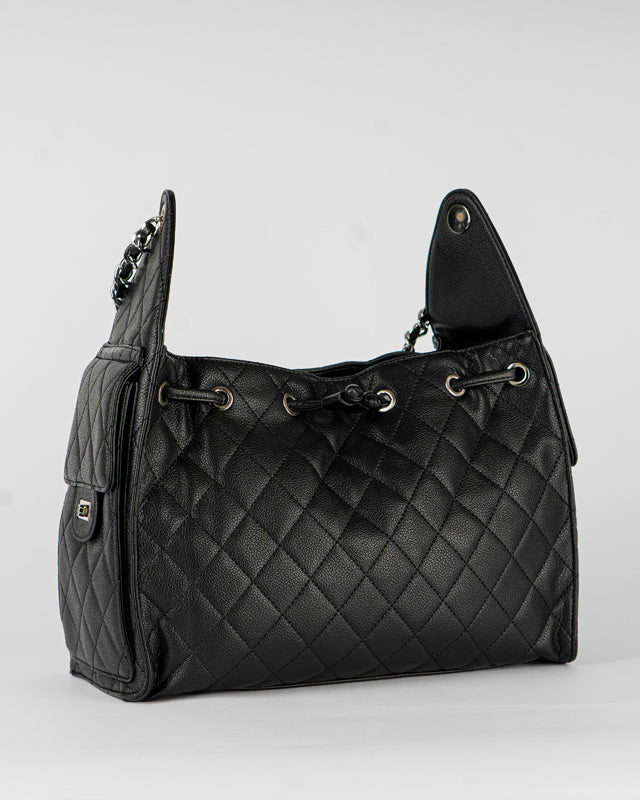 Borsa trapuntata con tasche laterali