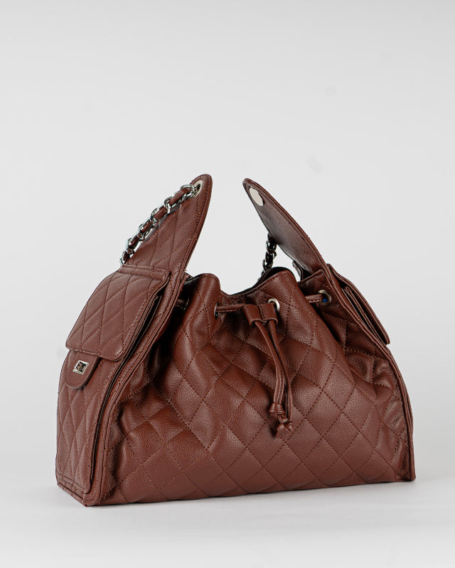 Borsa trapuntata con tasche laterali