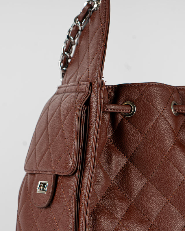 Borsa trapuntata con tasche laterali