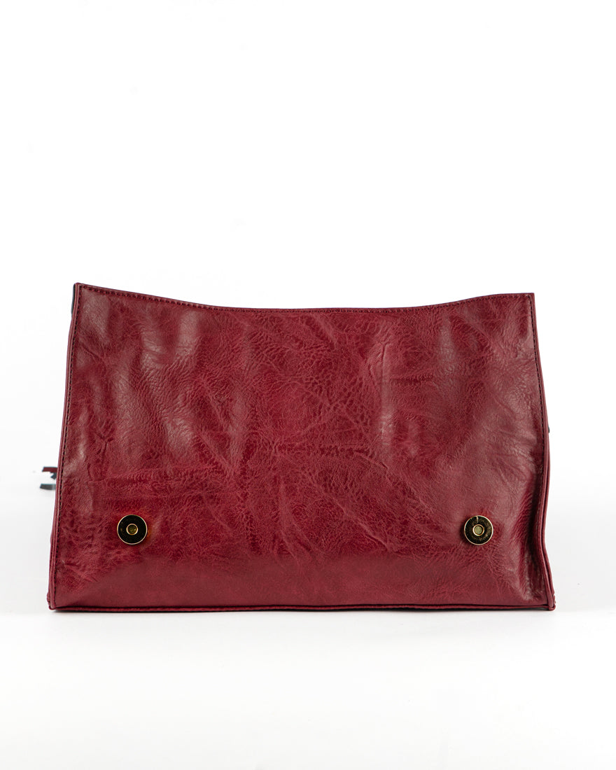 Borsa quadrata con borchie e frangie