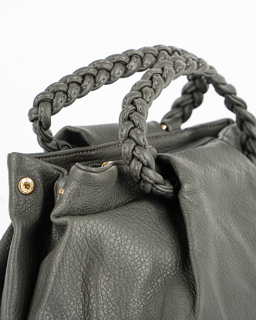 Borsa a mano con manico intrecciato