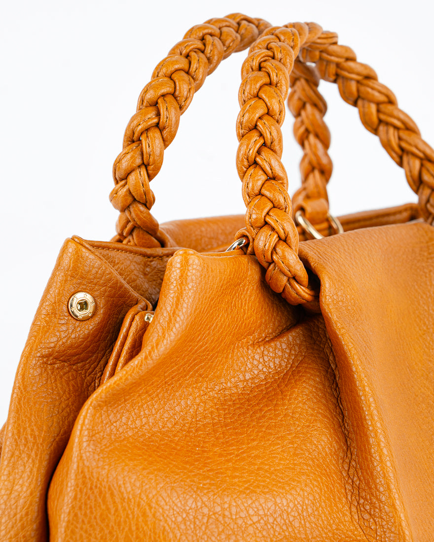 Borsa a mano con manico intrecciato